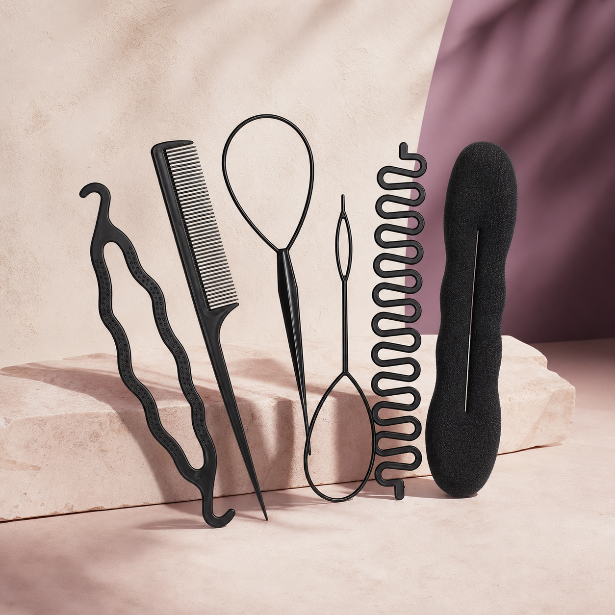 BraidEase Tool Set — 6 Piece photographed on a warm ivory and blush studio backdrop